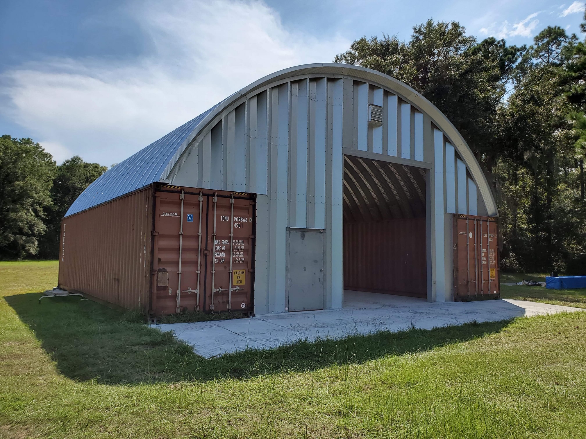 SteelMaster container cover sheltering equipment between two shipping containers